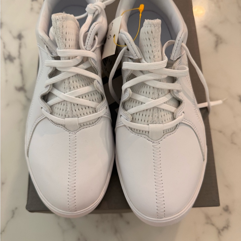Brand New in box kids golf shoes size 4